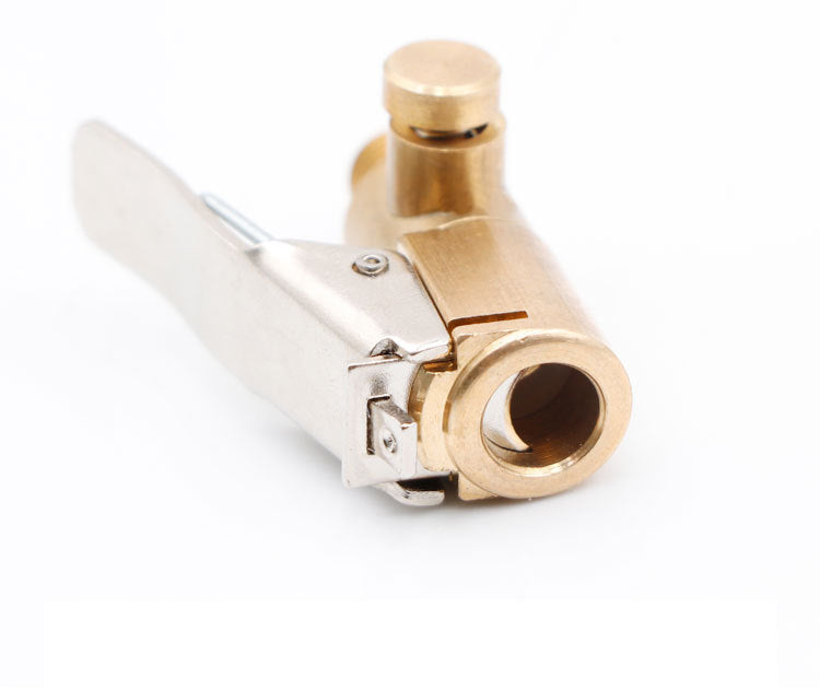 Brass tire inflator quick-connect adapter with clip-on lock shown in a close-up view.