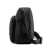 Black men's water-resistant nylon crossbody sling bag shown from the back.