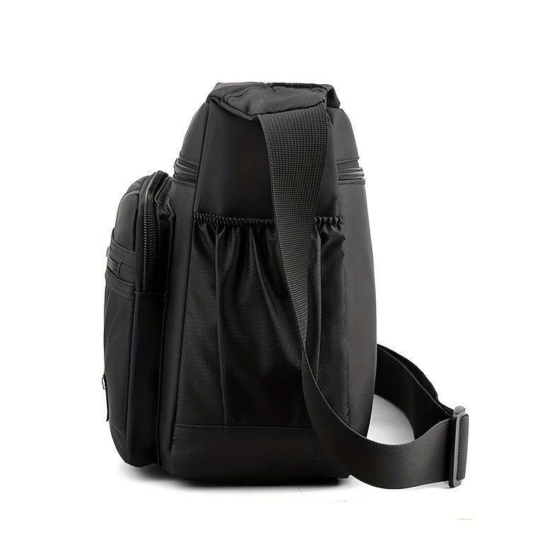 Black men's water-resistant nylon crossbody sling bag shown from the back.