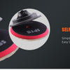 A close-up view of a black wool polishing pad with a red edge, showing how to self-adhere it to a plate.