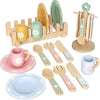 A wooden cookie play food set featuring various baking accessories like spatulas and a muffin tin.