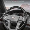 A black carbon fiber steering wheel cover for a Cadillac vehicle.