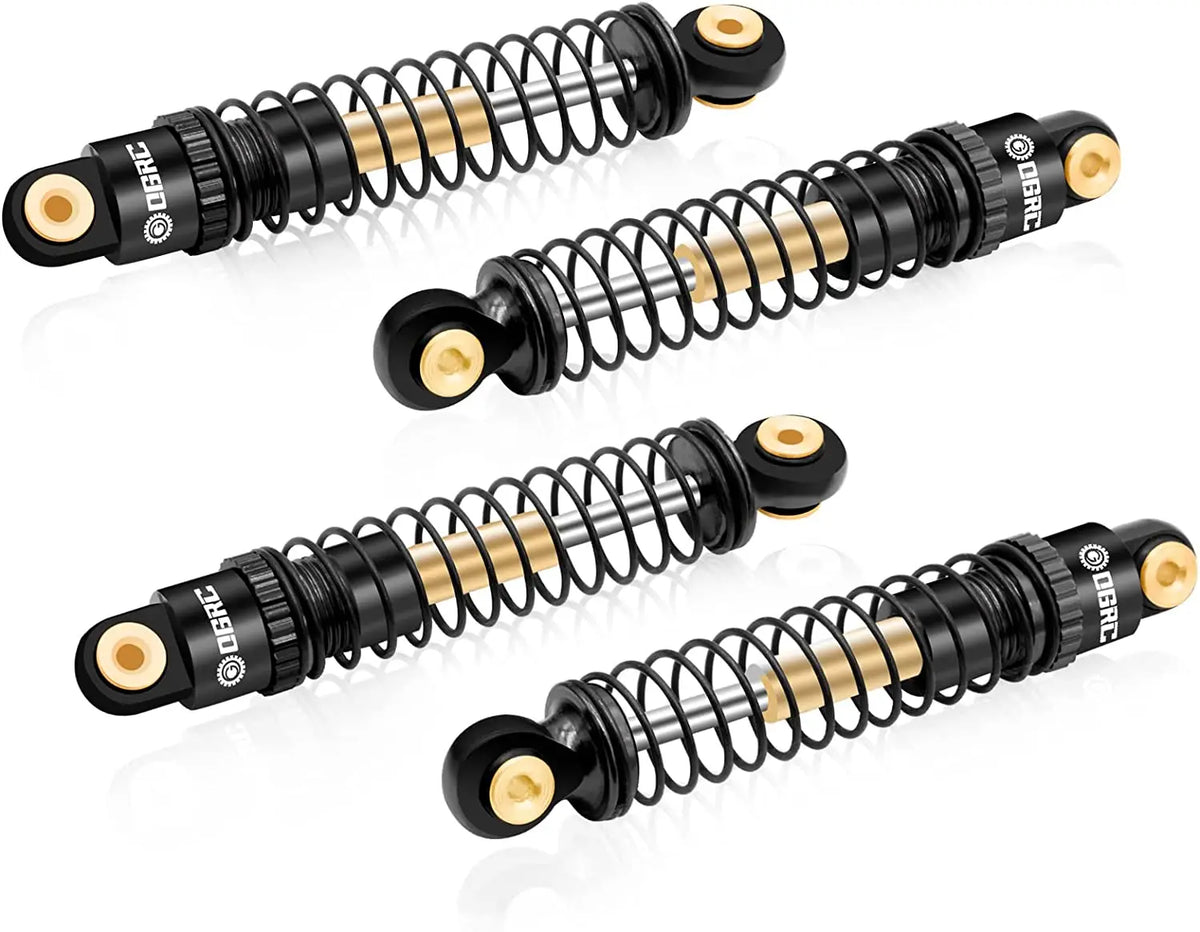 A set of black and gold aluminum shock absorbers for RC crawlers.