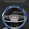A close-up view of a glossy carbon fiber steering wheel cover designed to contour to the palm.