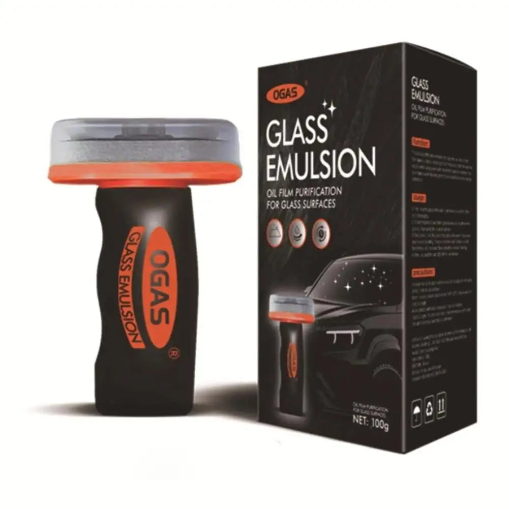 A black bottle of OGAS Glass Emulsion oil film purification with an orange cap and brush visible.