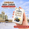 A hand holds a card titled Umrah Dua Card featuring an Islamic lantern design against a backdrop of a mosque.