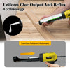 A hand is using a cordless electric caulking gun with an LED light to apply uniform glue output onto a wooden surface.