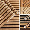 Roll of wood grain striped peel-and-stick wallpaper showing various patterns and textures