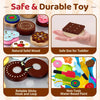 A set of wooden cookie play food toys including cookies and baking accessories like a hook and loop