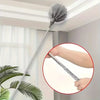 A long, silver adjustable spider web ceiling cleaner with a gray microfiber head is shown against a white ceiling.