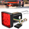 A red LED brake and tail light assembly with a running function and wiring harness for a truck hitch receiver.
