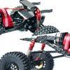 Close-up of a red and black aluminum shock absorber set for an RC crawler vehicle.