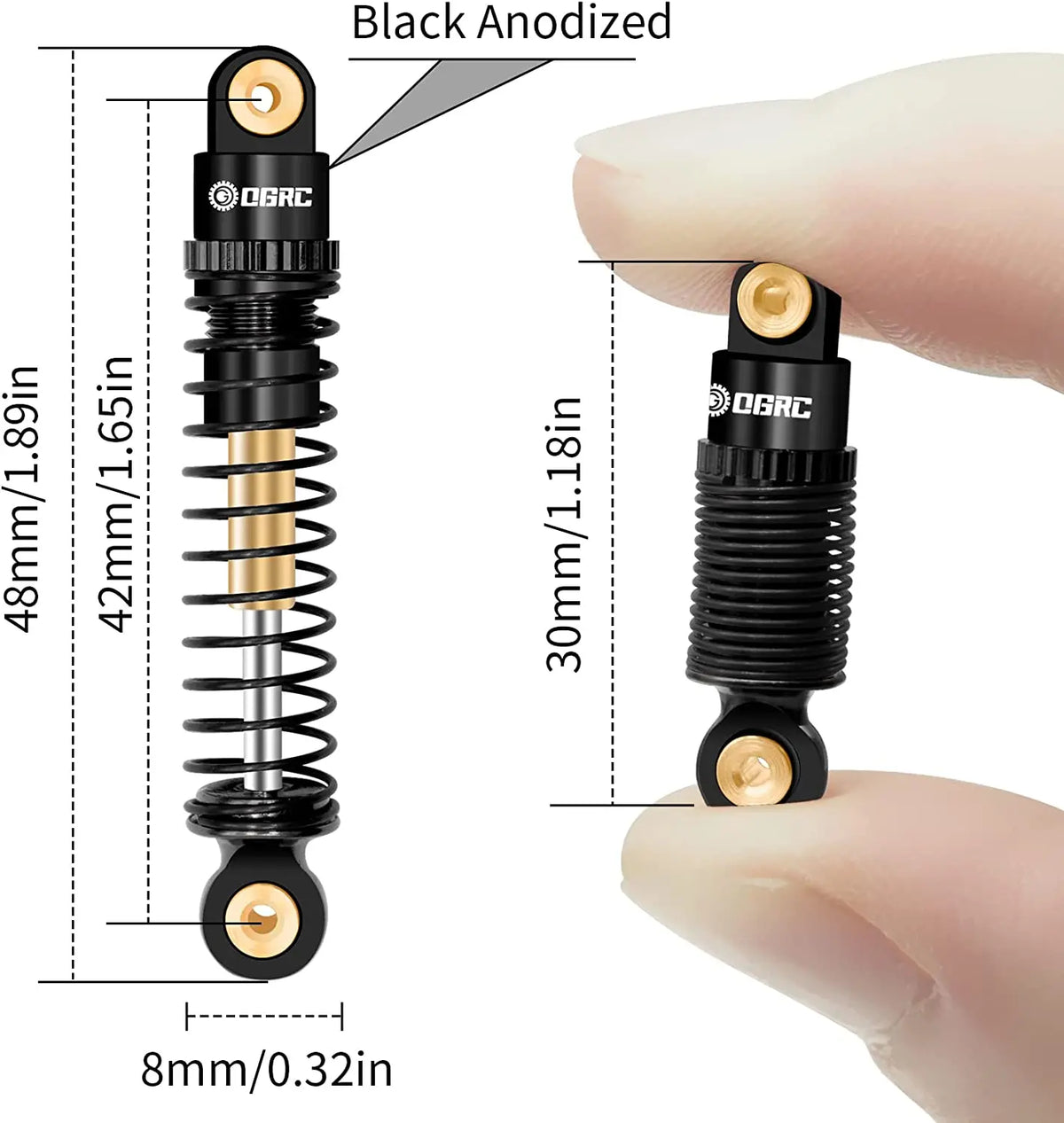 A black anodized aluminum shock absorber with a gold-colored coil spring shown next to a human finger for scale.