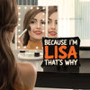 A black canvas makeup bag with orange text that reads Because I'm Lisa That's why displayed on a table.