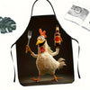 A black apron featuring a graphic illustration of a rooster holding a bottle and a fork.