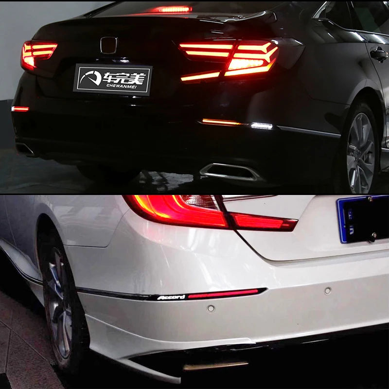 Close-up view of LED rear bumper reflector lights on a black Honda Accord sedan and a white Honda Accord sedan.