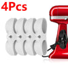 Four white adhesive cord organizers for kitchen appliances shown next to a red appliance.
