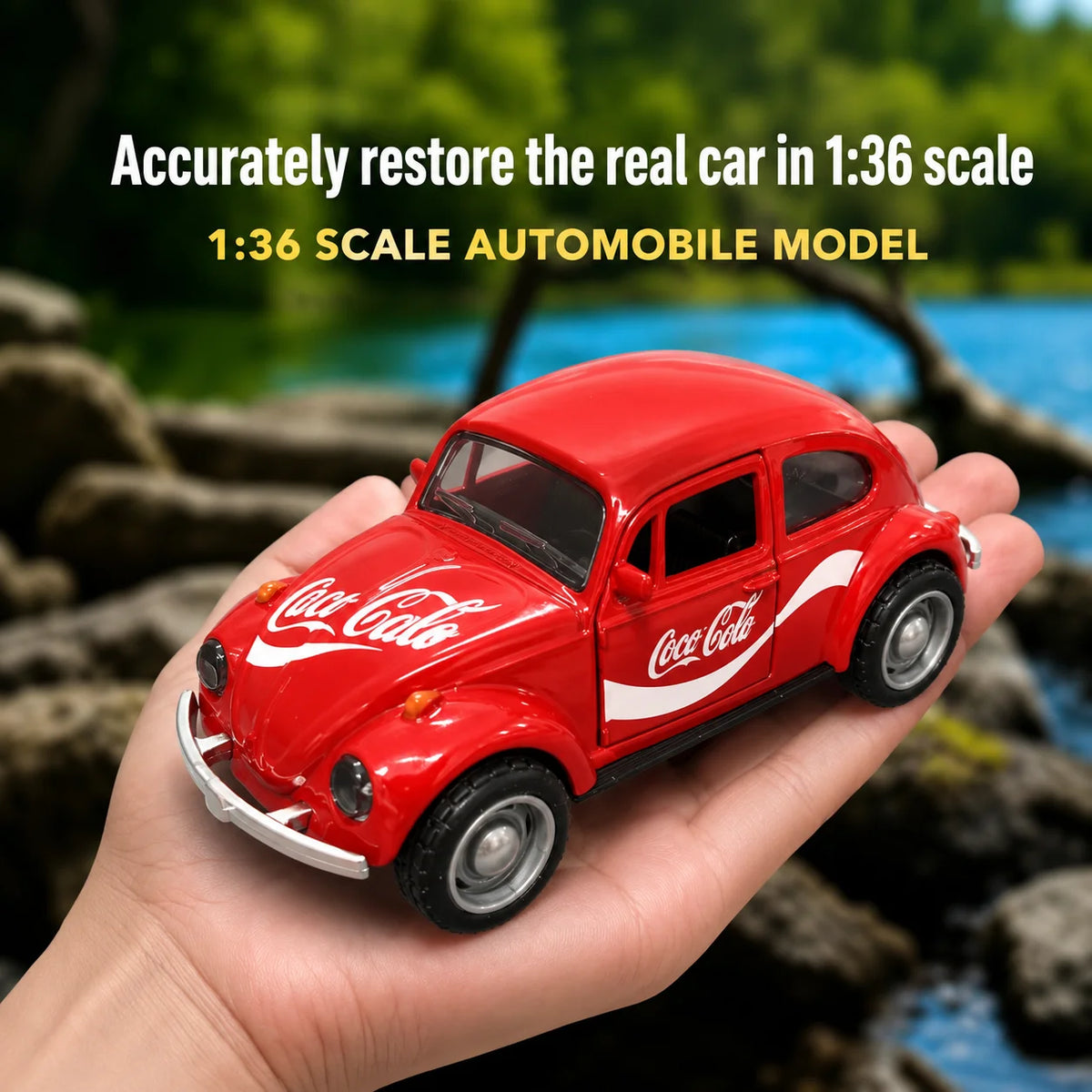 A hand holds a red 1:36 scale Coca-Cola Volkswagen Beetle die-cast model against a natural outdoor background.