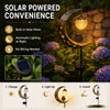 Solar powered moon-shaped garden light with an owl and glass ball illuminating the night