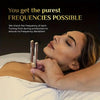A woman is shown applying a tuning fork to her body during sound therapy or meditation.
