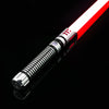 A close-up view of a Neo Pixel lightsaber with a smooth swing and 12 color RGB blade, reflecting on a black surface.