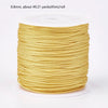 A roll of 0.8mm red nylon cord for jewelry making and crafting.
