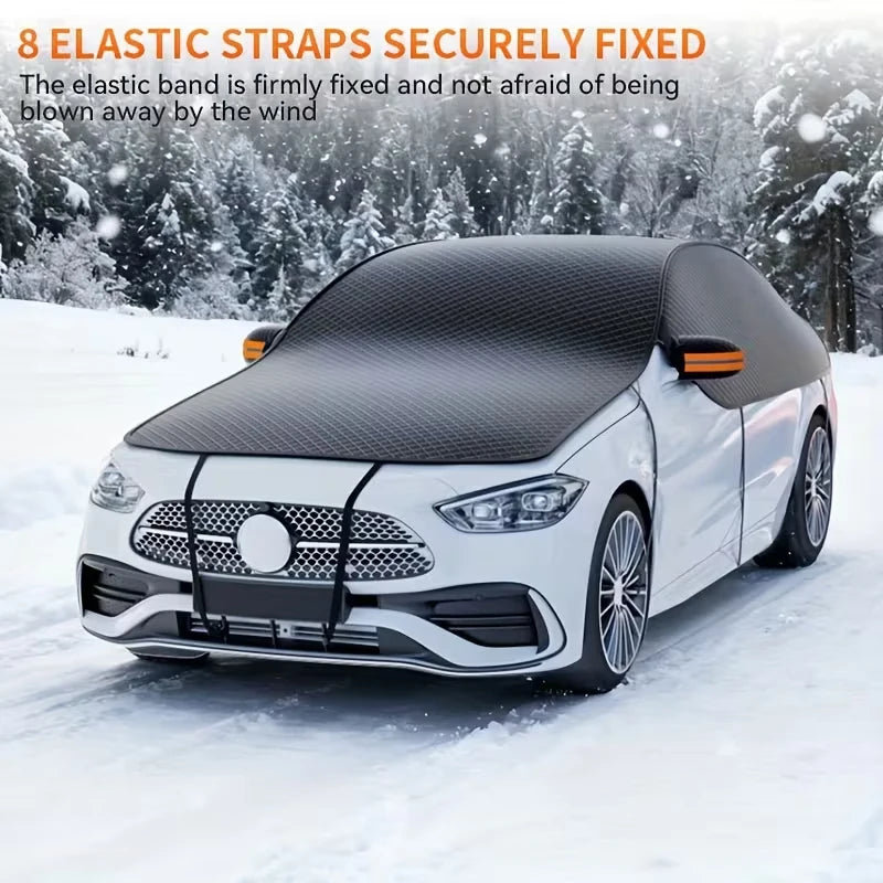 A white car is shown covered with a black elastic strap wind shield cover in a snowy outdoor setting.