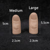 A comparison of medium and large silicone thumb tip illusion props, showing their sizes and dimensions.