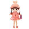 A soft pink rabbit fairy plush doll with long hair and a wide-brimmed hat.