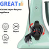 A silicone adhesive cord organizer is shown attached to a light green kitchen appliance.