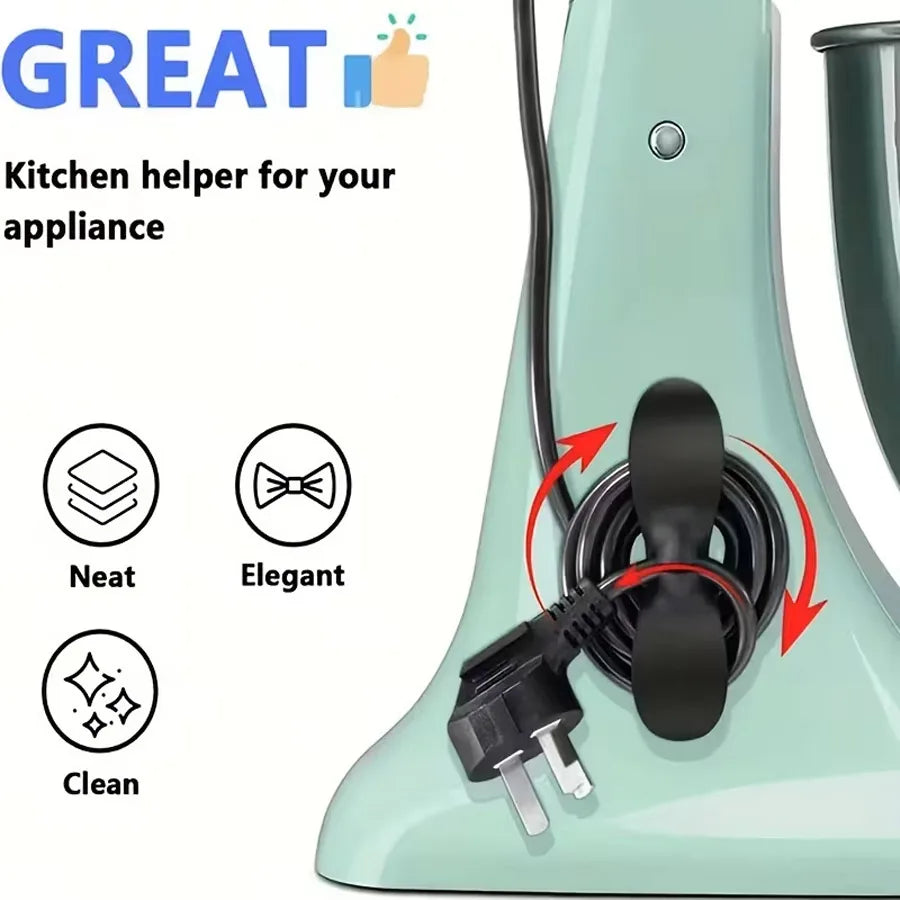 A silicone adhesive cord organizer is shown attached to a light green kitchen appliance.