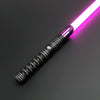 A black lightsaber with a bright pink blade is shown diagonally against a dark background.