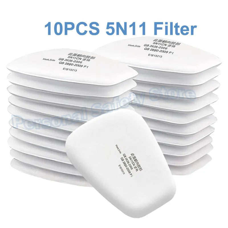 A stack of ten 5N11 filters for a half face respirator mask with anti-fog safety goggles.