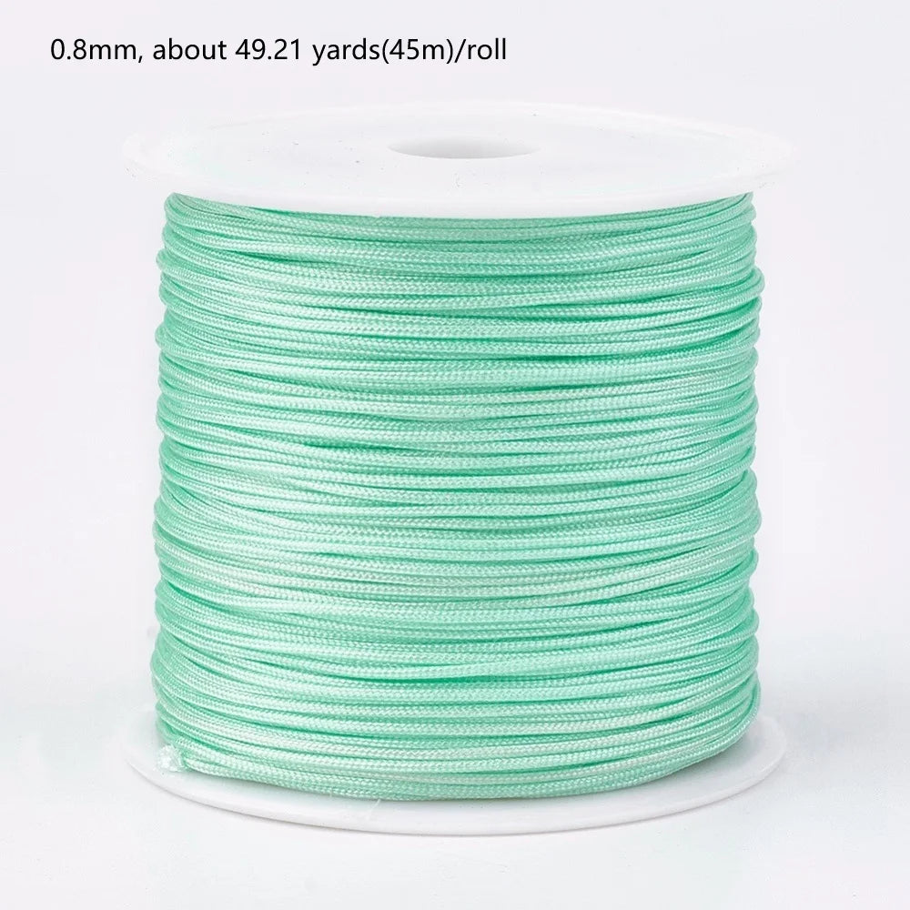 Roll of 0.8mm green nylon cord for jewelry making and crafting