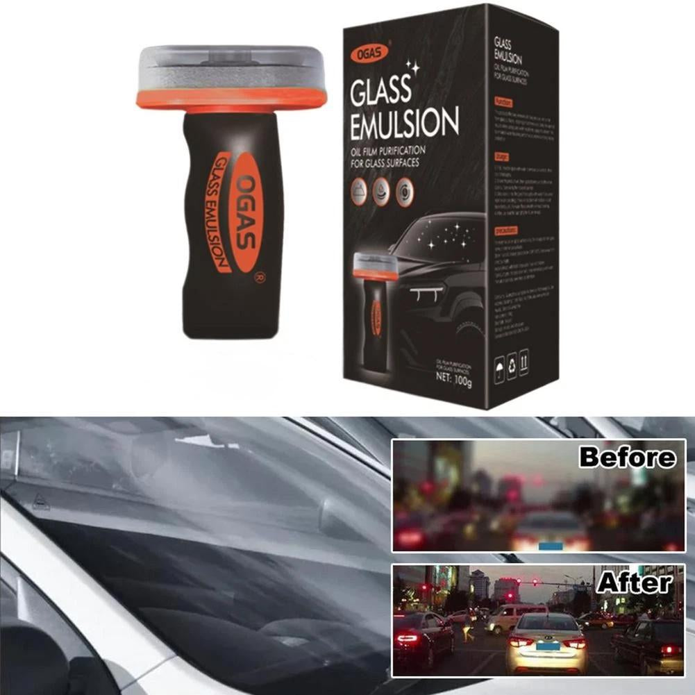 A black cleaning brush with an orange handle is shown next to its packaging for glass emulsion.