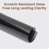 A roll of black scratch resistant window tint film is shown in a side view.