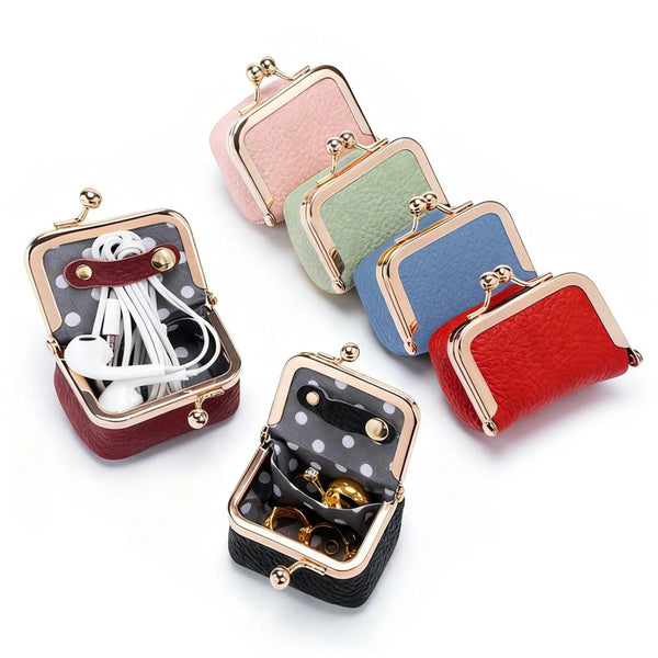 A collection of vintage PU leather jewelry boxes in various pastel and deep colors with gold accents.
