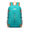 A teal backpack with orange accents and gray mesh panels, designed for travel and outdoor activities.