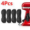 Four black adhesive cord organizers for kitchen appliances shown next to a red appliance.