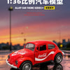 A red vintage Volkswagen Beetle die-cast model car is displayed on a wet surface with an orange sunset background.