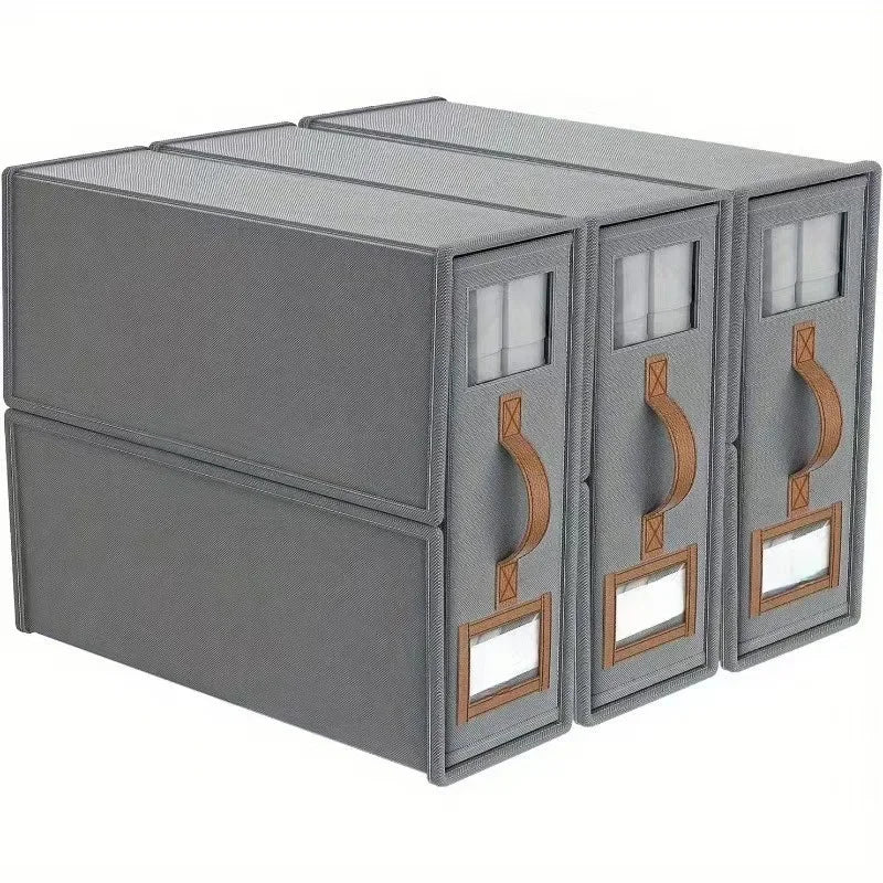 A gray foldable bedding storage box with clear window panels.