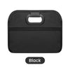 Black foldable car trunk organizer with carry handles.