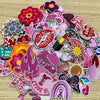 A collection of pink themed embroidered cartoon iron-on patches featuring various shapes and designs.