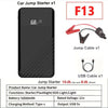 Black car jump starter with a red connector and USB cable for battery charging