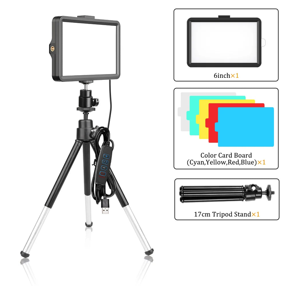 A black video light panel with a tripod stand, color card board, and remote control.