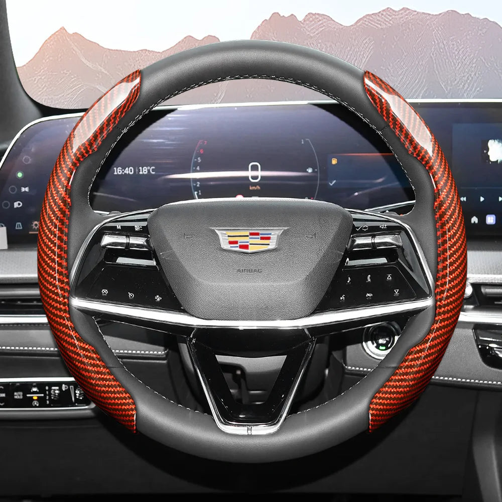 A close-up view of a glossy carbon fiber steering wheel cover inside a car cockpit.