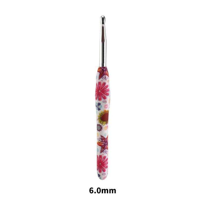 A single ergonomic crochet hook with a floral design, measuring 6.0mm.