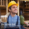 A man wearing a yellow hard hat holds a green power drill and a jar of deck screws in a wooden construction setting.