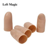 A set of light peach colored silicone thumb tips used as a magic trick illusion prop.