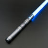 A close-up of a Neo Pixel lightsaber with a glowing blue blade and a black hilt against a dark background.